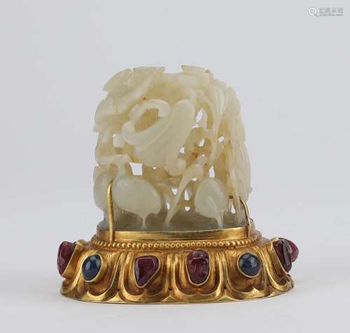A CARVED WHITE JADE FINIAL