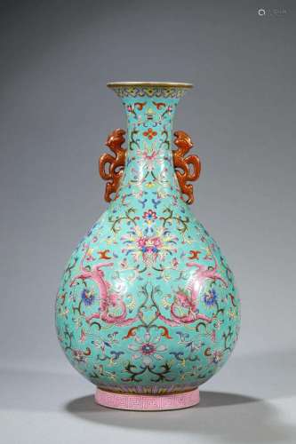 A TOURQUOISE GROND FAMILLE ROSE VASE.MARK OF QIANLONG