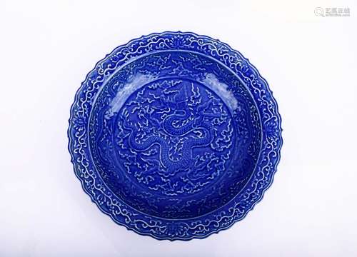 A BLUE-GLAZED 'DRAGON' DISH.MARK OFXUANDE