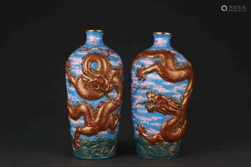 A PAIR OF FAMILLE-ROSE 'DRAGON' VASES.MARK OF QIANLONG