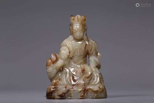 A WHITE JADE CARVING OF SEATED GUANYIN