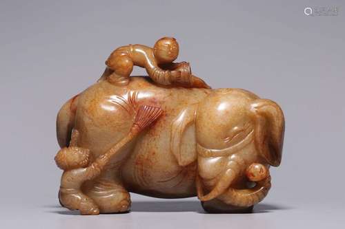 A CARVED JADE ELEPHANT AND BOY