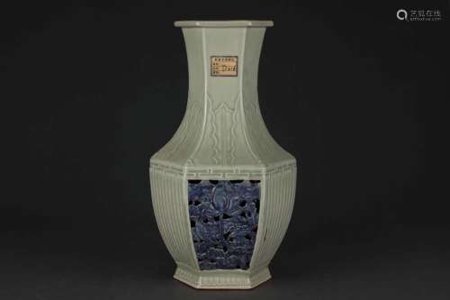 A CELADON-GROUND BLUE AND WHITE VASE.MARK OF QIANLONG