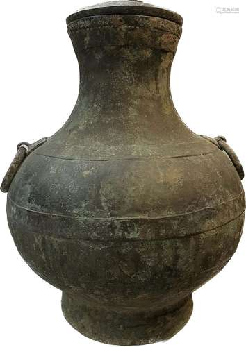 A LARGE BRONZE  VASE AND COVER