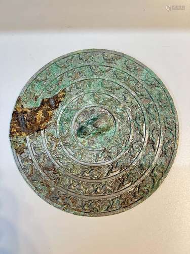 A BRONZE MIRROR