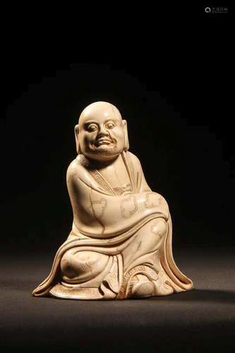 A SOAPSTONE CARVING OF LUOHAN