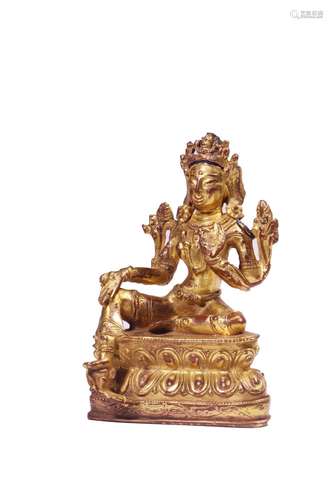 A GILT BRONZE FIGURE OF TARA