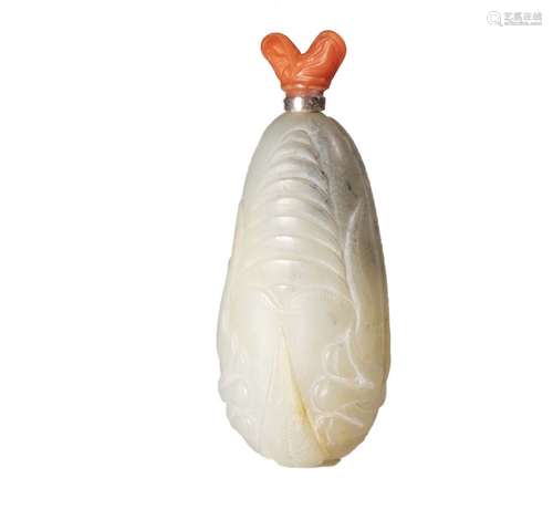 A CARVED WHITE JADE SNUFF BOTTLE