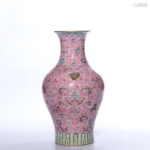 A RUBY-GROUND FAMILLE ROSE BOTTLE VASE.MARK OF JIAQING