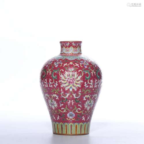 A RUBY-GROUND FAMILLE-ROSE VASE.MARK OF QIANLONG