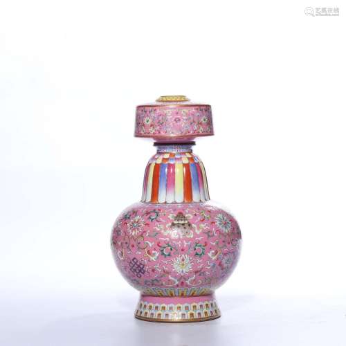 A RUBY-GROUND FAMILLE-ROSE VASE.MARK OF QIANLONG