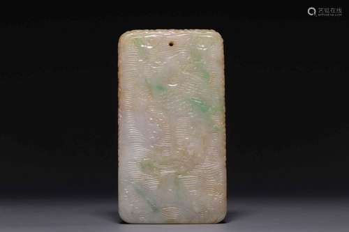 A CARVED JADEITE PLAQUE