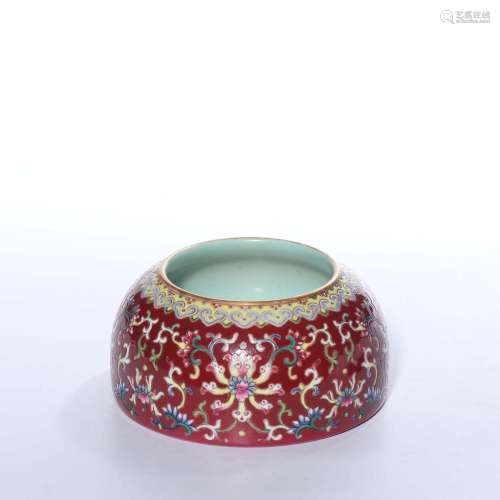 A PAIR OF RUBY-GROUND FAMILLE-ROSE BOWLS.MARK OF QIANLONG