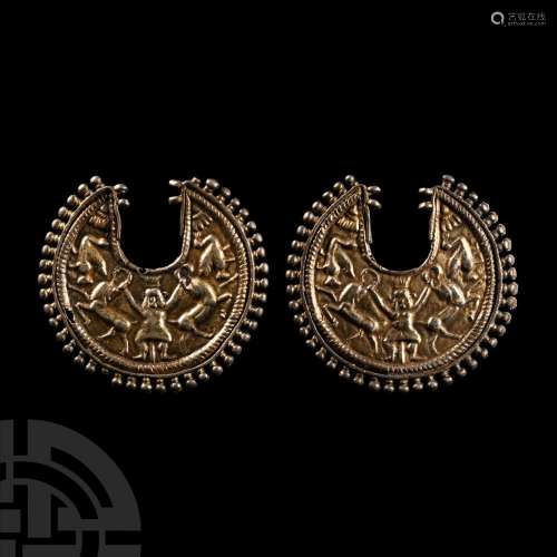 Egypto-Persian Silver-Gilt Earring Pair with Bes Holding Two...