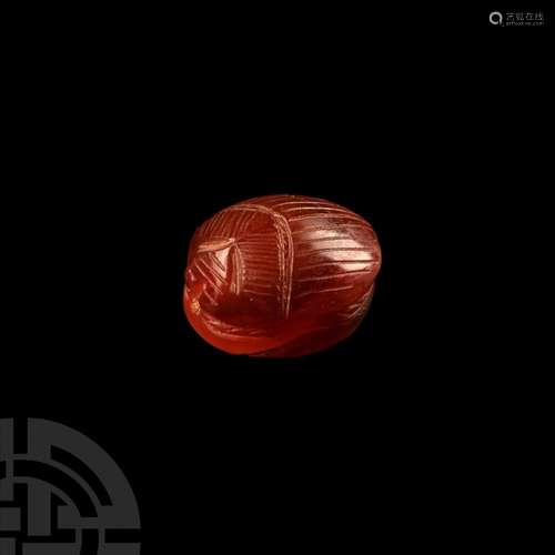 Etruscan Red Carnelian Scaraboid with Archery Intaglio