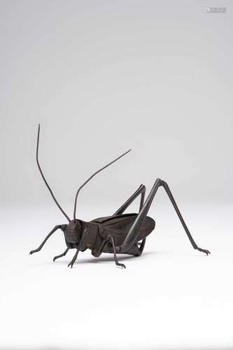 A JAPANESE IRON JIZAI OKIMONO (ARTICULATED MODEL) OF A GRASS...