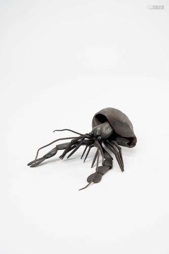 A JAPANESE IRON JIZAI OKIMONO (ARTICULATED MODEL) OF A HERMI...