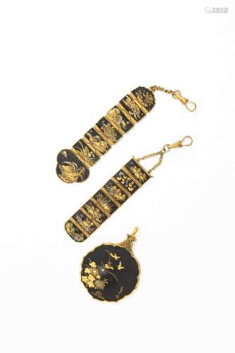 A JAPANESE DAMASCENE LOCKET AND TWO FOBS MEIJI OR LATER, 19T...