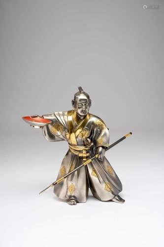 A JAPANESE SILVERED AND PARCEL-GILT BRONZE OKIMONO OF MORI T...