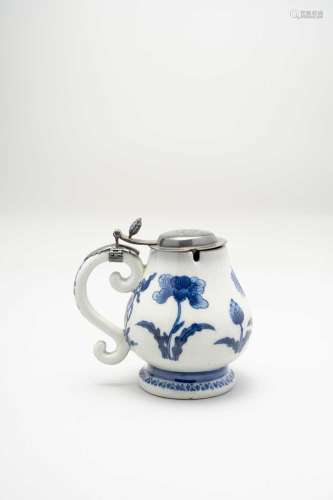 A JAPANESE BLUE AND WHITE MUSTARD POT FOR THE EUROPEAN MARKE...