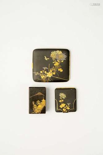 A JAPANESE DAMASCENE CIGARETTE CASE, MATCH STRIKER, AND MATC...