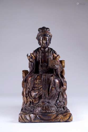 Chine. Dans le style Ming.\nGuanyin assise. Bois scu