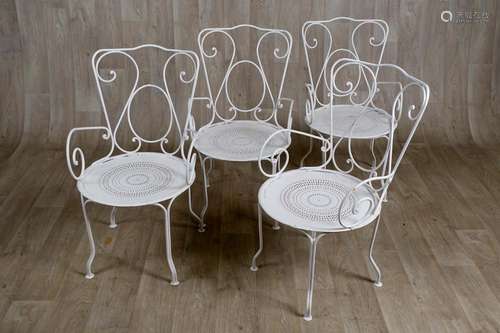 Suite de quatre Fauteuils de jardin.\nDossiers à enr