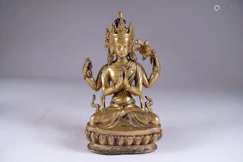 Avalokiteshvara.\nReprésentée assise en tailleur, de