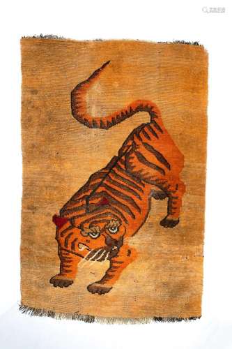 A TIBETAN TIGER RUGLATE QING DYNASTYDecorated with a large t...