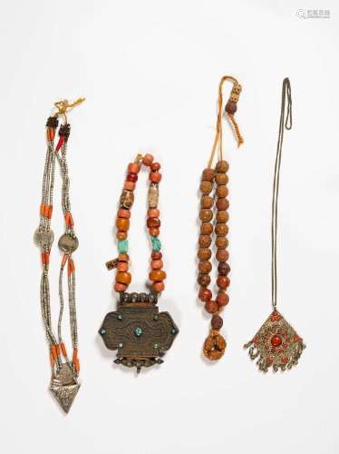 FOUR CHINESE AND TIBETAN NECKLACES19TH AND 20TH CENTURYVario...