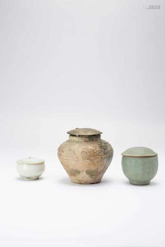 THREE CHINESE JARS AND COVERS HAN-MING DYNASTYThe largest wi...