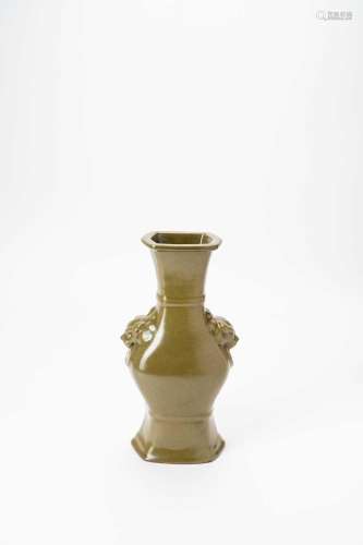 A CHINESE ARCHAISTIC TEADUST GLAZED VASE QING DYNASTYThe hex...