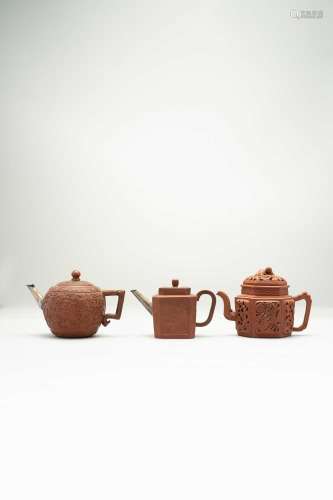 THREE CHINESE YIXING TEAPOTS AND COVERS18TH CENTURYOne hexag...