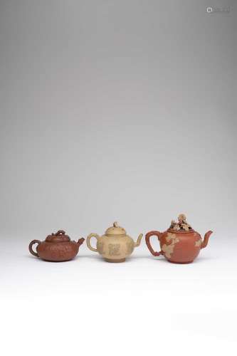 THREE CHINESE YIXING TEAPOTS AND COVERS 18TH CENTURYOne appl...