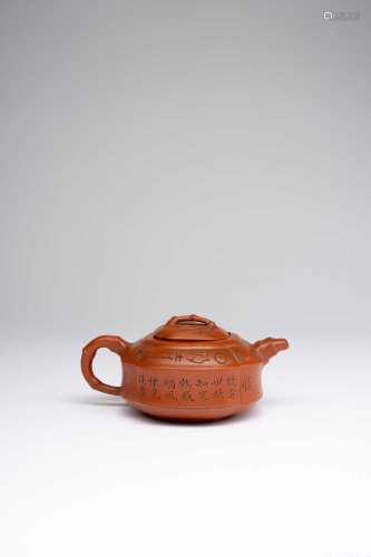 A CHINESE YIXING CALLIGRAPHIC TEAPOT AND COVERREPUBLIC PERIO...