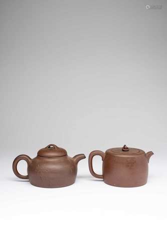 TWO CHINESE YIXING TEAPOTS AND COVERS19TH AND 20TH CENTURYOn...