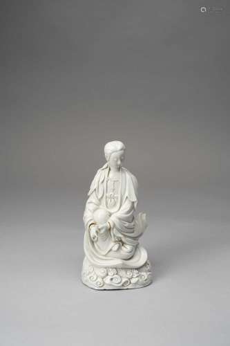 A CHINESE BLANC DE CHINE FIGURE OF GUANYIN17TH CENTURYThe Go...