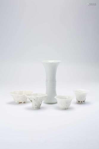 FOUR CHINESE BLANC DE CHINE LIBATION CUPS AND AN ARCHAISTIC ...