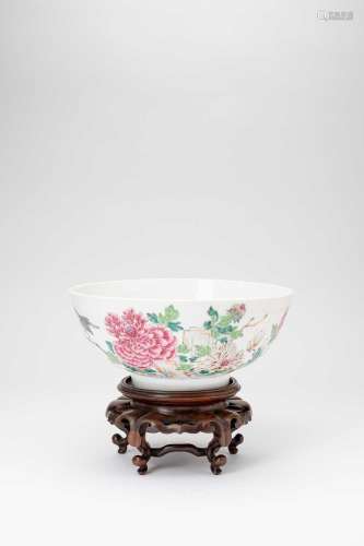A CHINESE FAMILLE ROSE BOWLMID 18TH CENTURYPainted with two ...