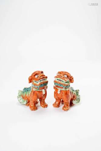 A PAIR OF CHINESE IRON-RED BUDDHIST LION DOGSC.1800Each sitt...
