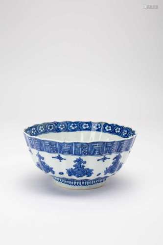 A CHINESE BLUE AND WHITE MOULDED \'FU SHOU\' BOWL KANGXI 166...