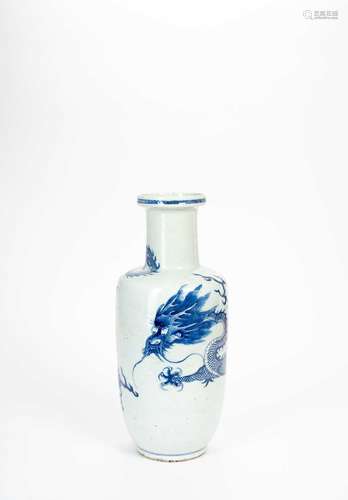 A CHINESE BLUE AND WHITE \'DRAGON\' ROULEAU VASEQING DYNASTY...