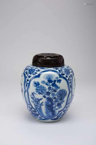A CHINESE BLUE AND WHITE OVOID ‘ANTIQUES AND FLOWERS’ JARKAN...