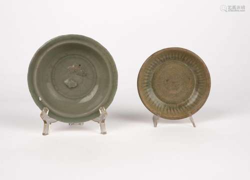 Two small celadon plates. China, 15th/16th c.