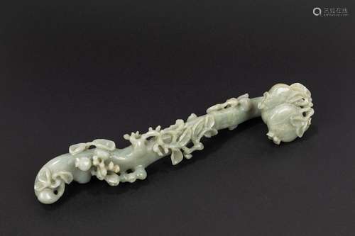 A celadon jade ruyi scepter. China, late 19th c.