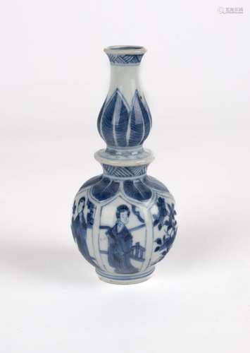 A small white and blue double-gourd vase. China, Kangxi Peri...