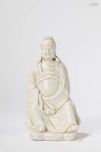 A Blanc de Chine seated figure. China, 19th c.