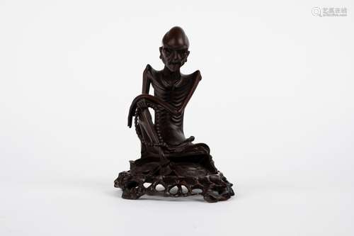 A boxwood ascetic buddha. China, 19th c.