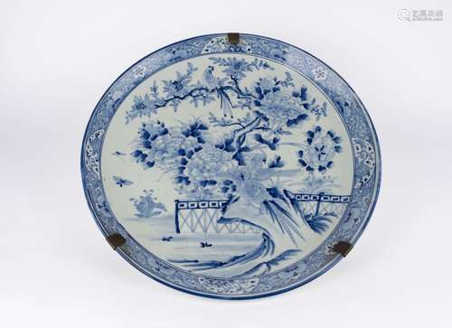 A large blue and white porcelain plate. Japan, 19th c.