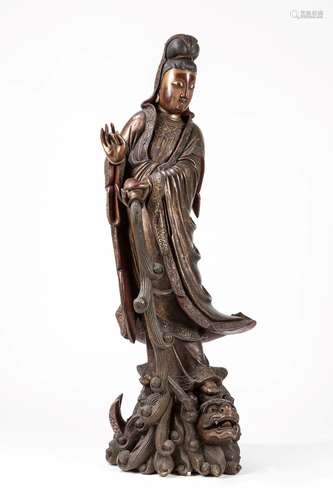 A large carved gilt wood Guanyin. China, 19th c.